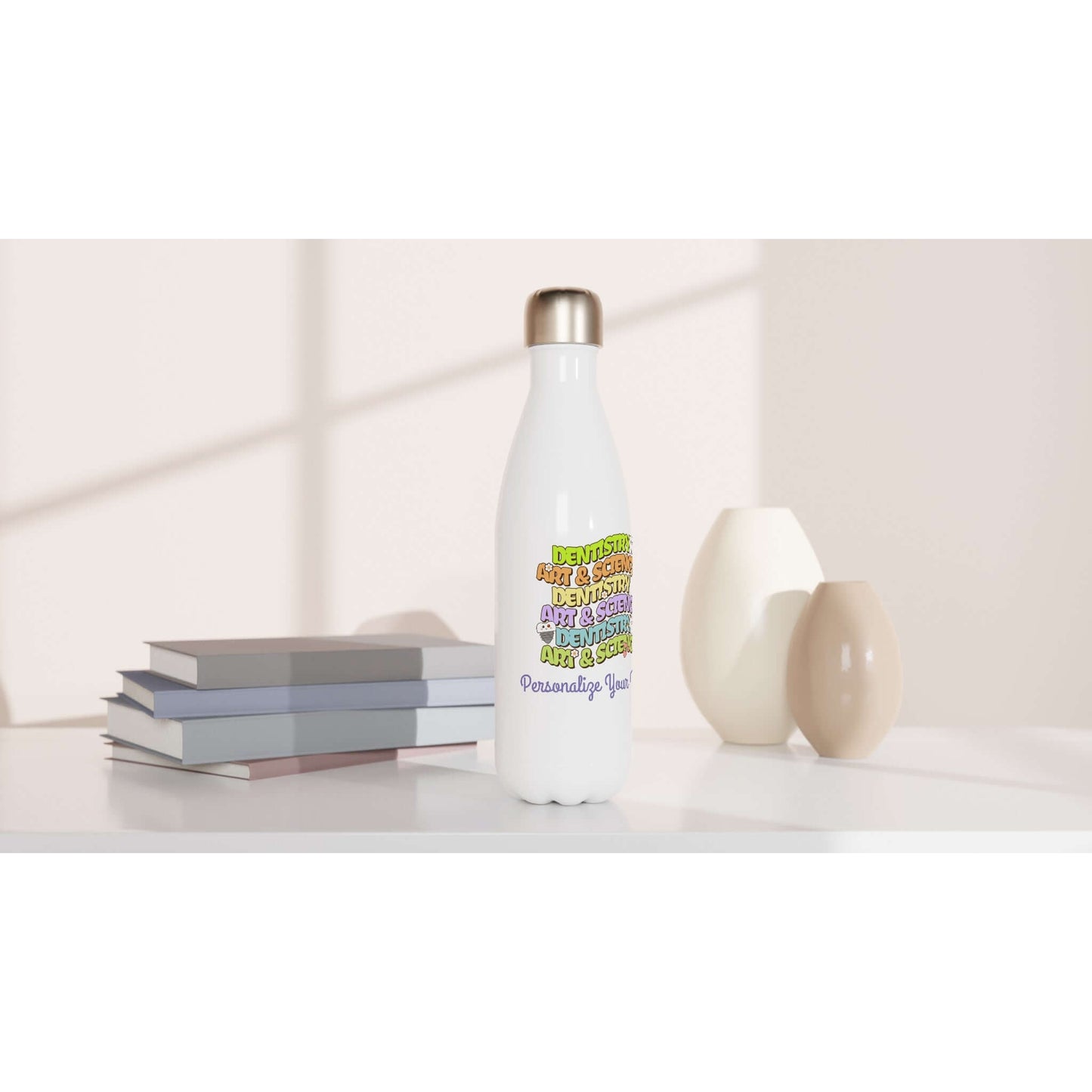 Art & Science Dentistry personalized 17oz stainless steel water bottle with colorful design on a modern tabletop.