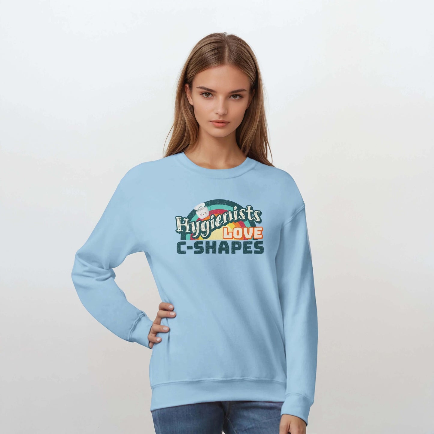 Model wearing a light blue Hygienists LOVE C-Shapes sweatshirt, showcasing the playful graphic design.