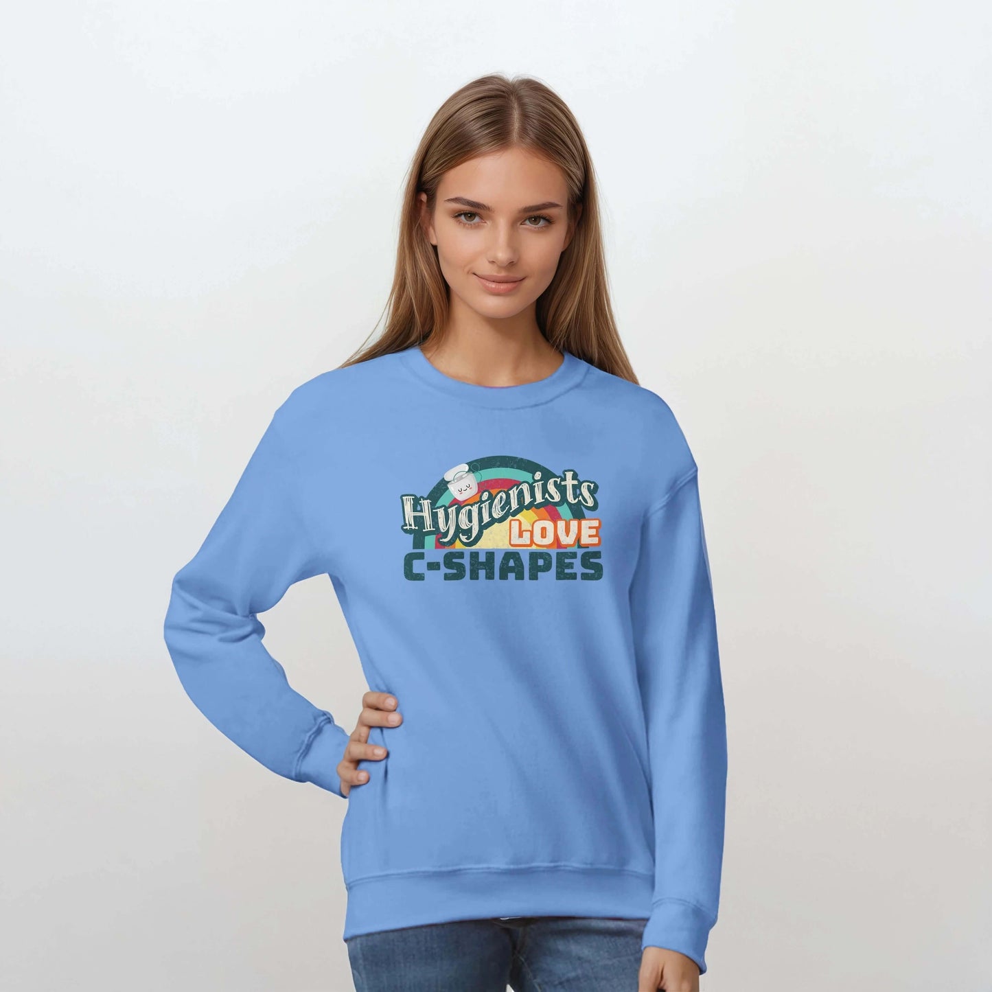 Hygienists LOVE C-Shapes personalized crewneck sweatshirt in blue worn by a model, showcasing playful dental pride.