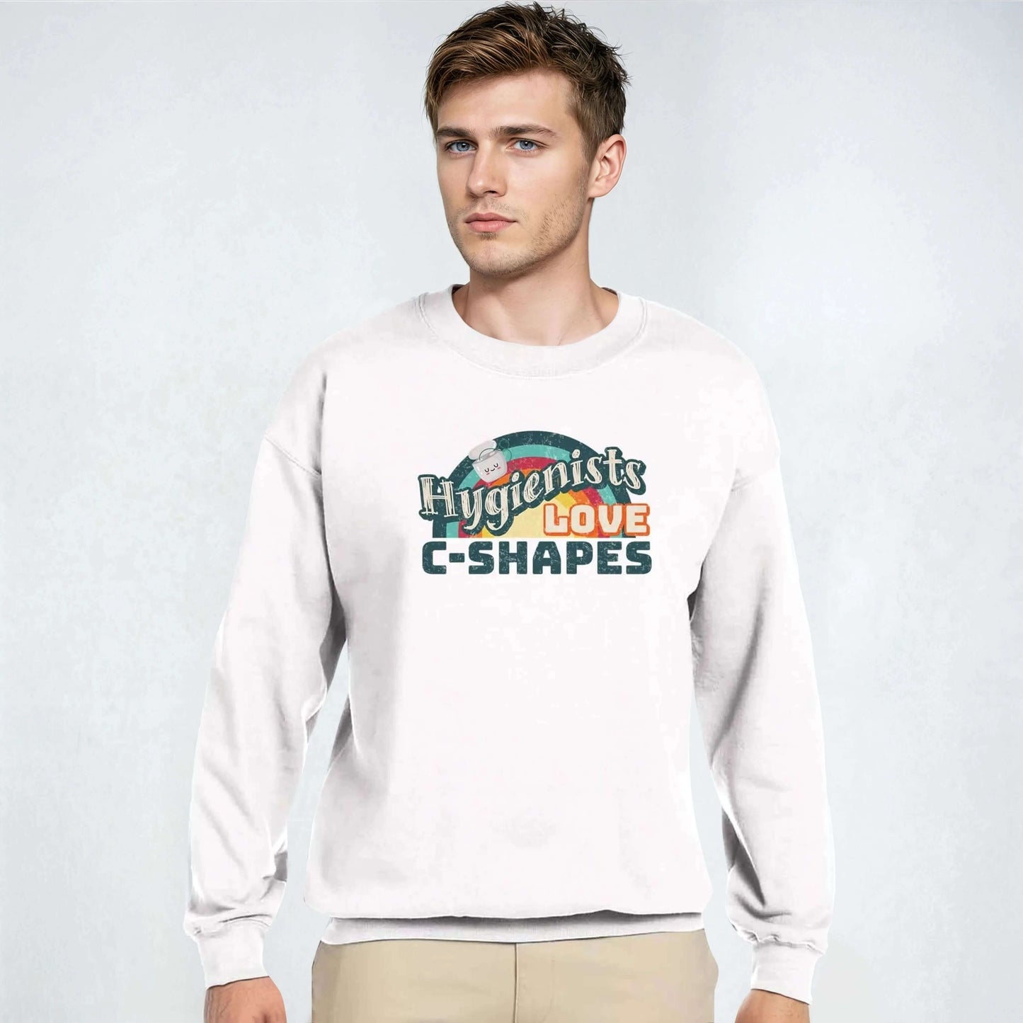 Man wearing a personalized Classic Unisex Crewneck Sweatshirt with 'Hygienists LOVE C-Shapes' graphic.