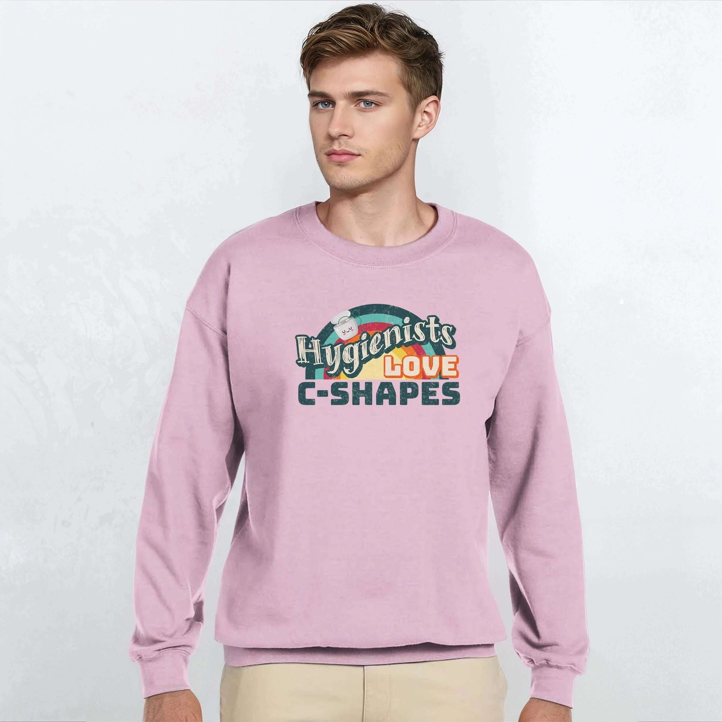 Hygienists LOVE C-Shapes personalized unisex crewneck sweatshirt on model in pink color.