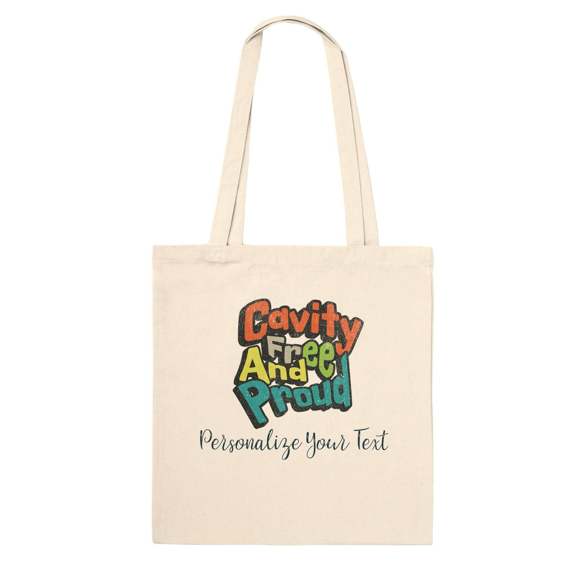 Cavity Free And Proud personalized premium tote bag, featuring colorful text on natural cotton fabric.