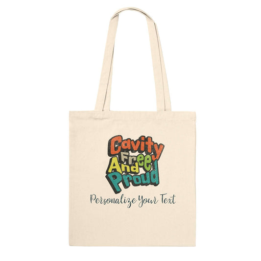 Cavity Free And Proud personalized premium tote bag, featuring colorful text on natural cotton fabric.