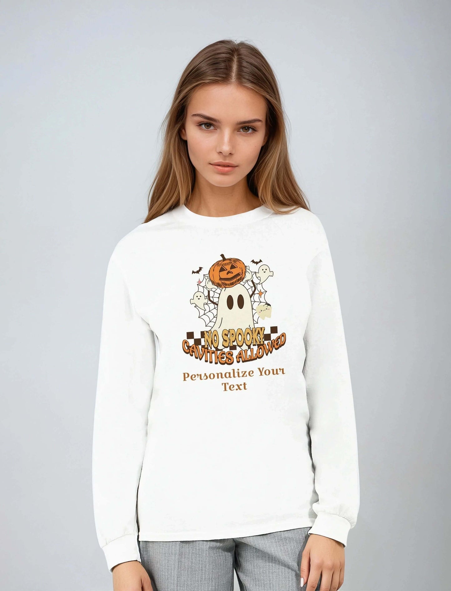 Classic Unisex Longsleeve T-Shirt with Personalized Halloween Dental Design featuring a playful ghost and pumpkin.