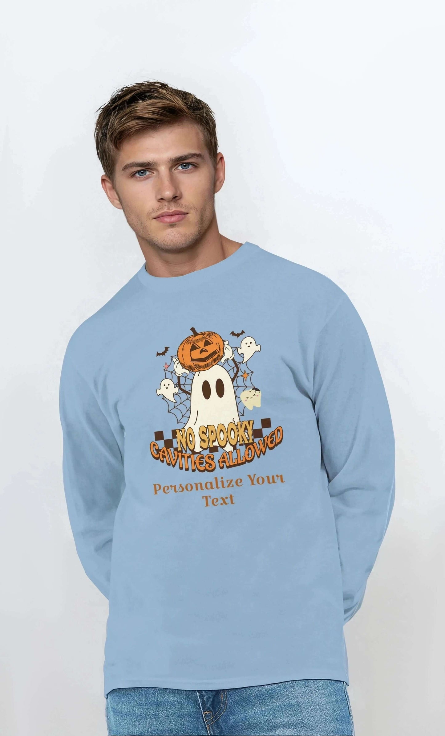Man wearing a light blue sweatshirt with Halloween graphics and text on a white background