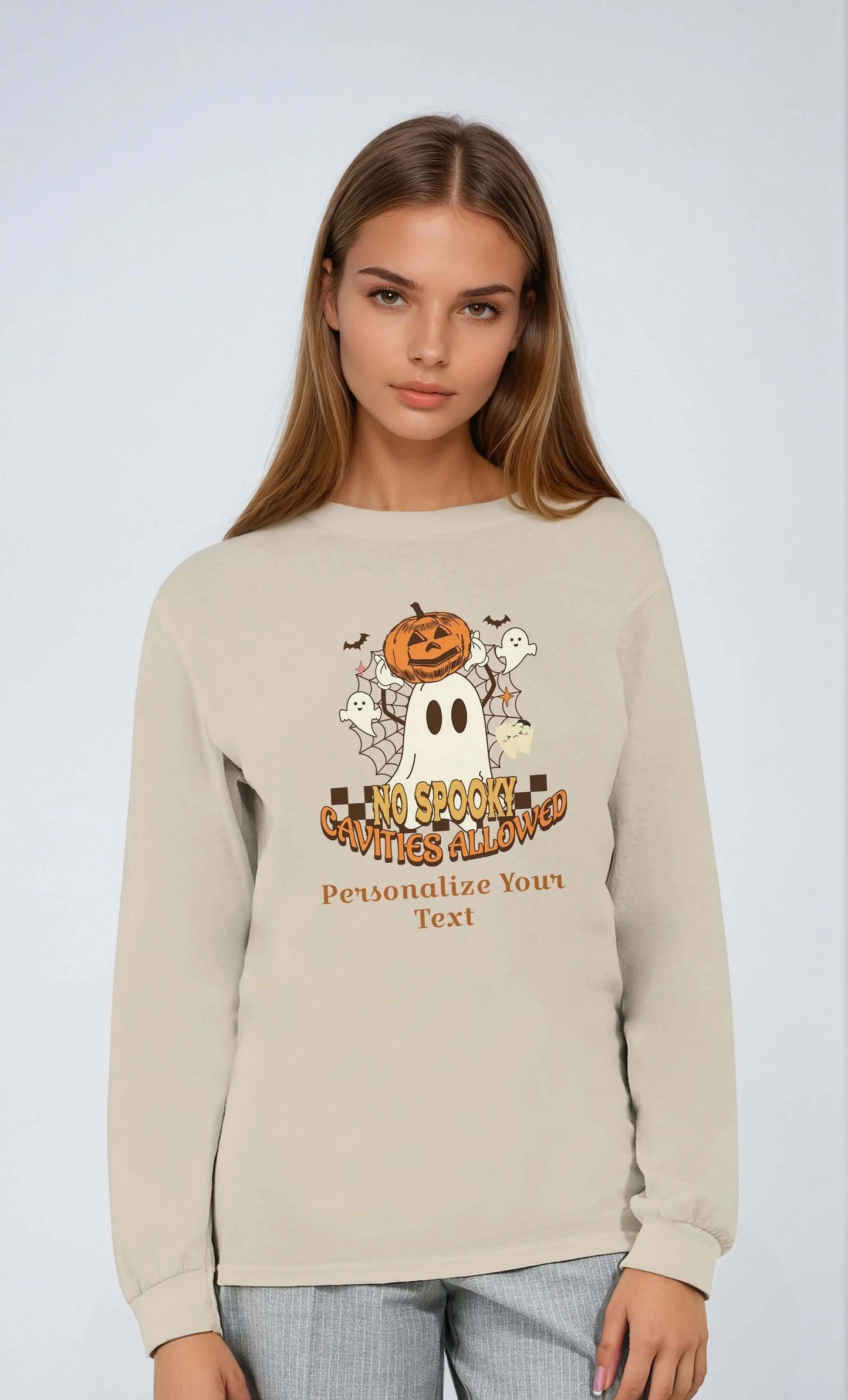 Classic unisex longsleeve t-shirt with personalized Halloween dental design featuring a ghost and pumpkin.