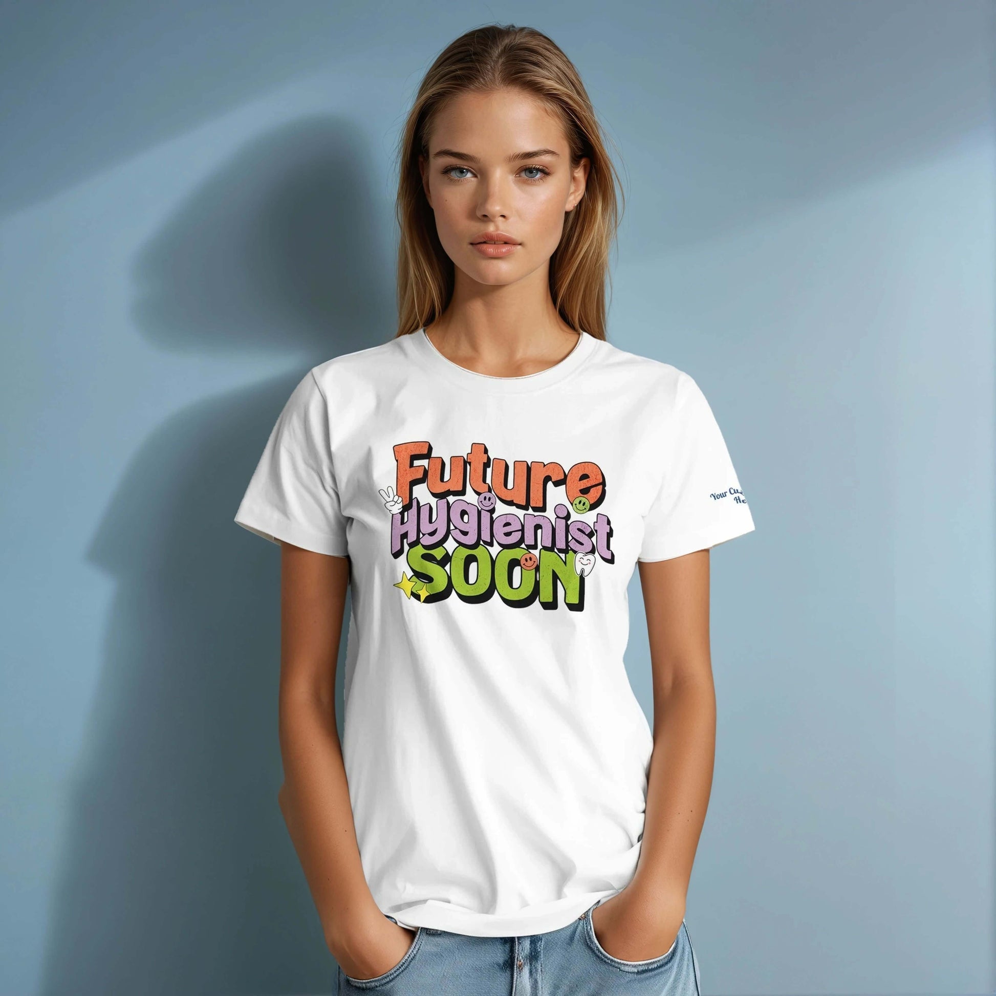 Future Hygienist Soon personalized heavyweight unisex crewneck T-shirt model wearing it against a light blue background.