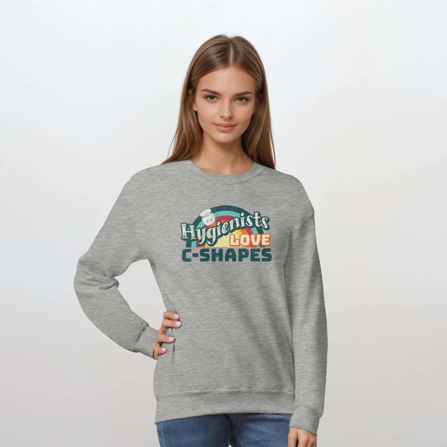 Woman wearing a gray sweatshirt featuring "Hygienists LOVE C-Shapes" graphic, perfect for dental professionals.