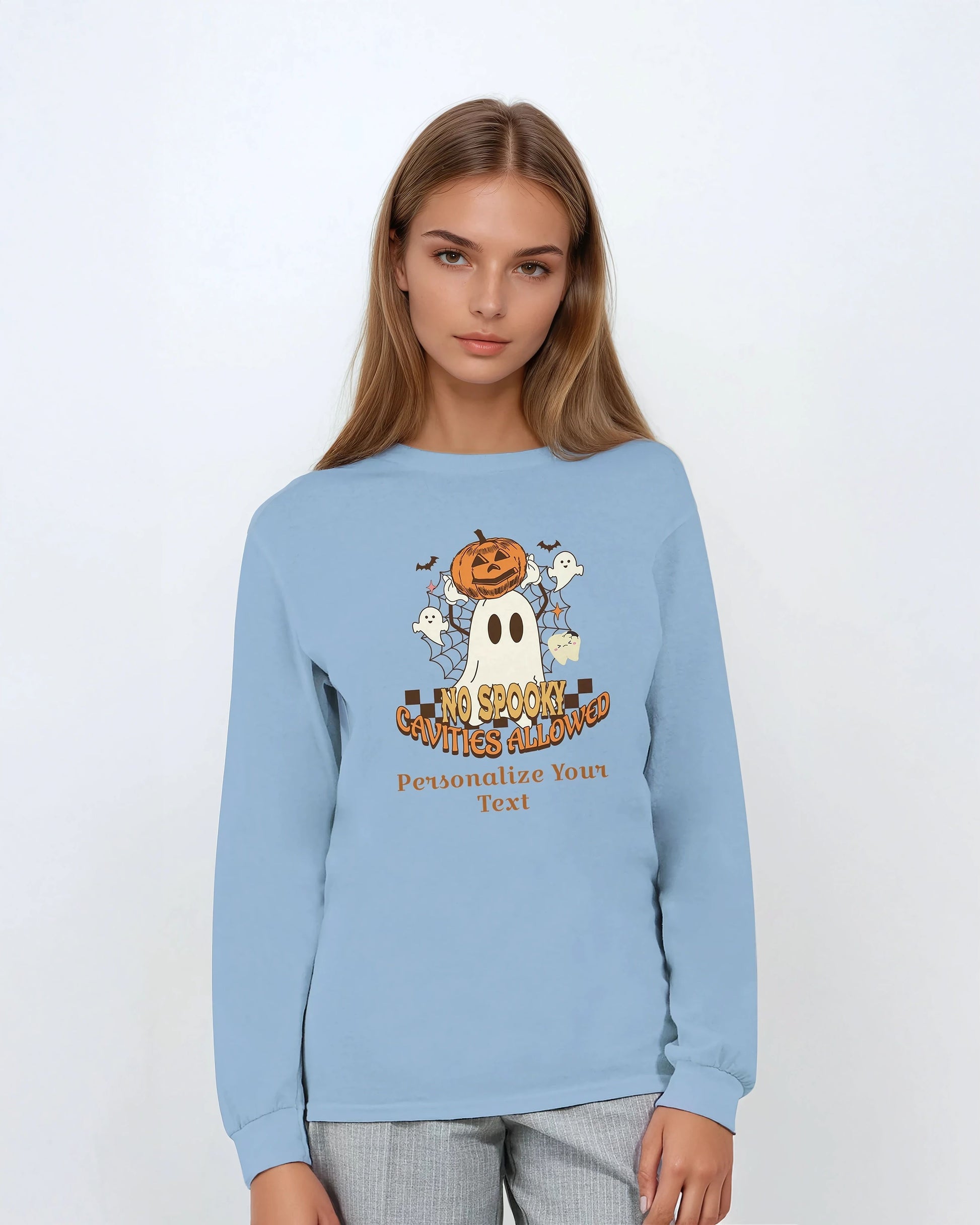 Light blue sweatshirt with Halloween design and text on a white background