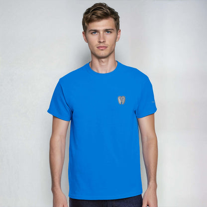 Person wearing a blue Personalized Heavyweight Unisex Crewneck T-Shirt with Smiling Tooth Embroidery.
