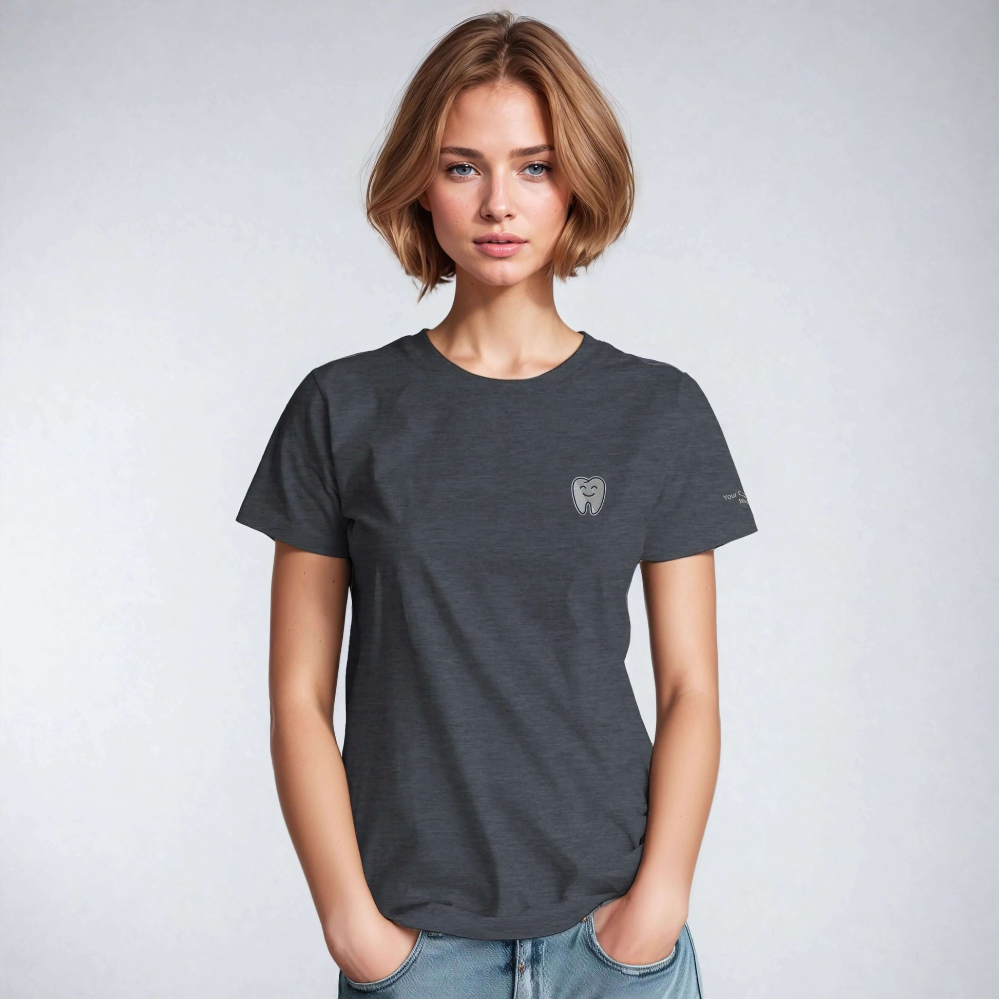 Personalized Heavyweight Unisex Crewneck T-Shirt featuring Smiling Tooth Embroidery on a model.