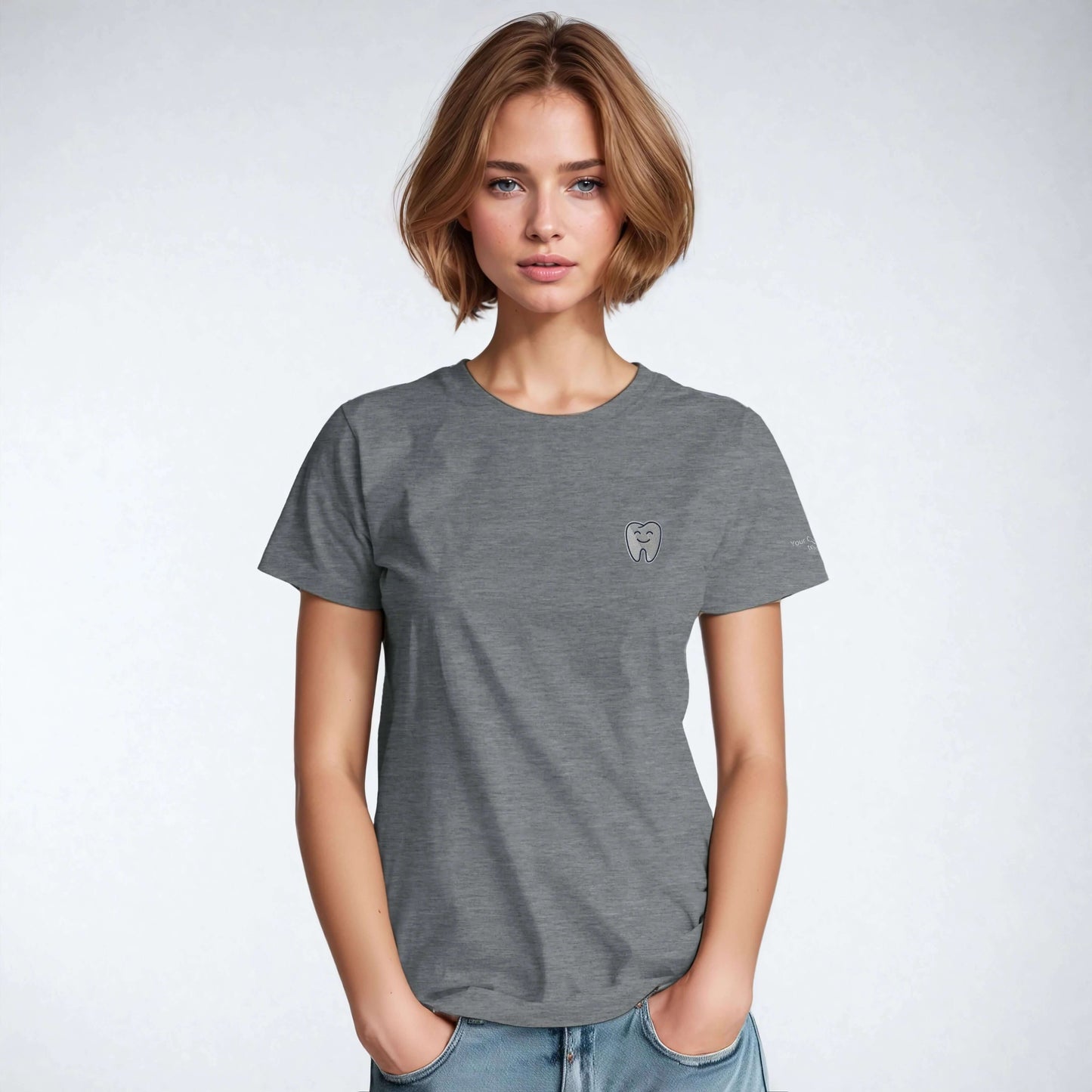 Personalized Heavyweight Unisex Crewneck T-Shirt with Smiling Tooth Embroidery, model wearing grey tee.