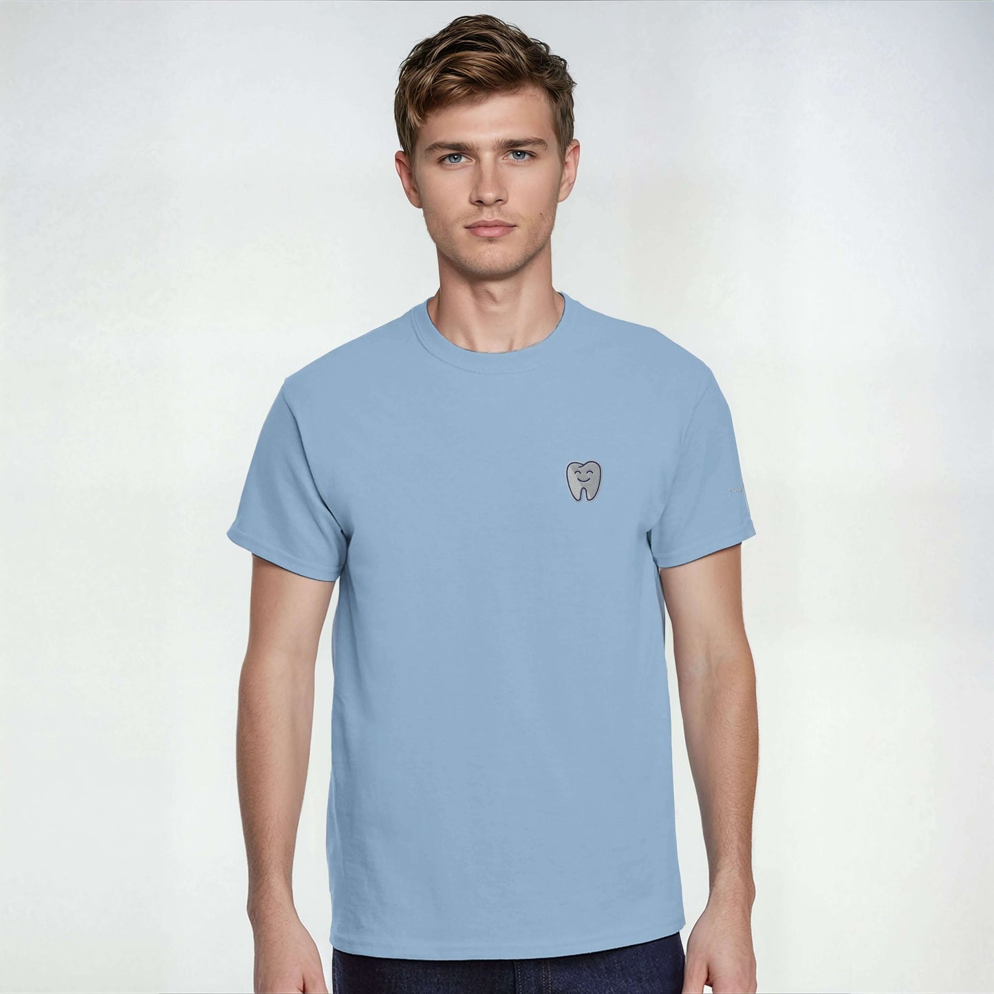 Personalized Heavyweight Unisex Crewneck T-Shirt with Smiling Tooth Embroidery on blue background