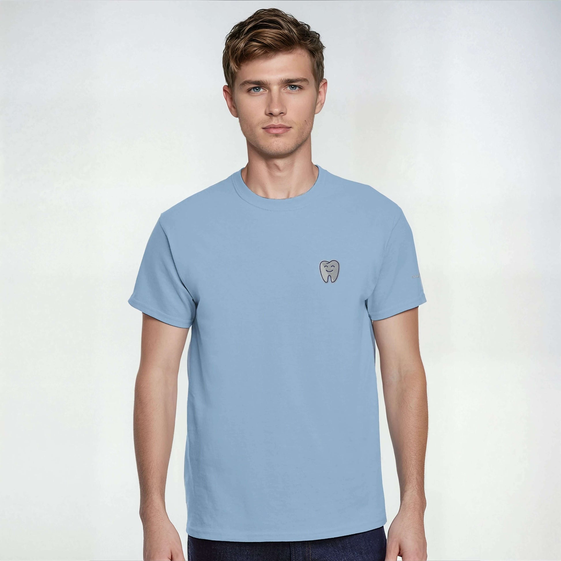 Personalized Heavyweight Unisex Crewneck T-Shirt with Smiling Tooth Embroidery on blue background