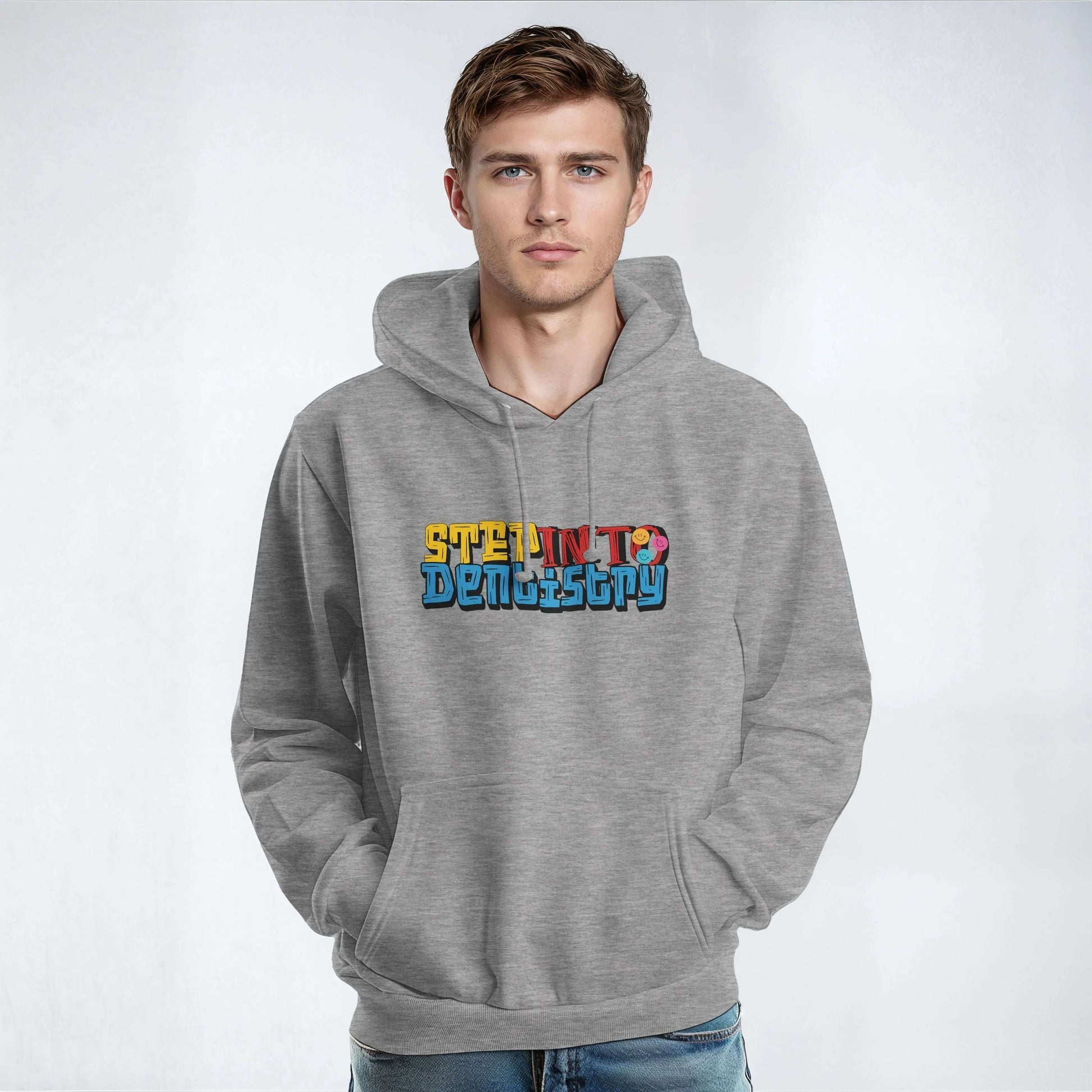 Gray unisex hoodie featuring 'Step Into Dentistry' design, perfect for dental students and professionals.