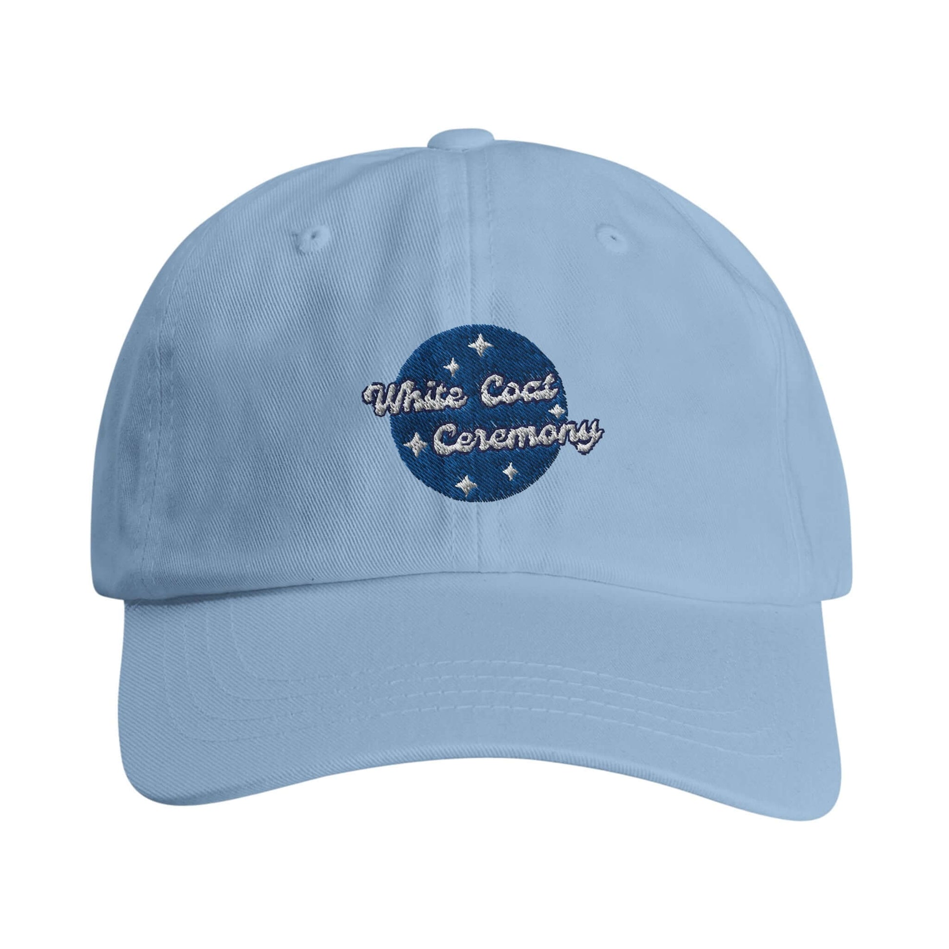 Blue cap with 'White Coat Ceremony' embroidery, celebrating future dentists' accomplishments.